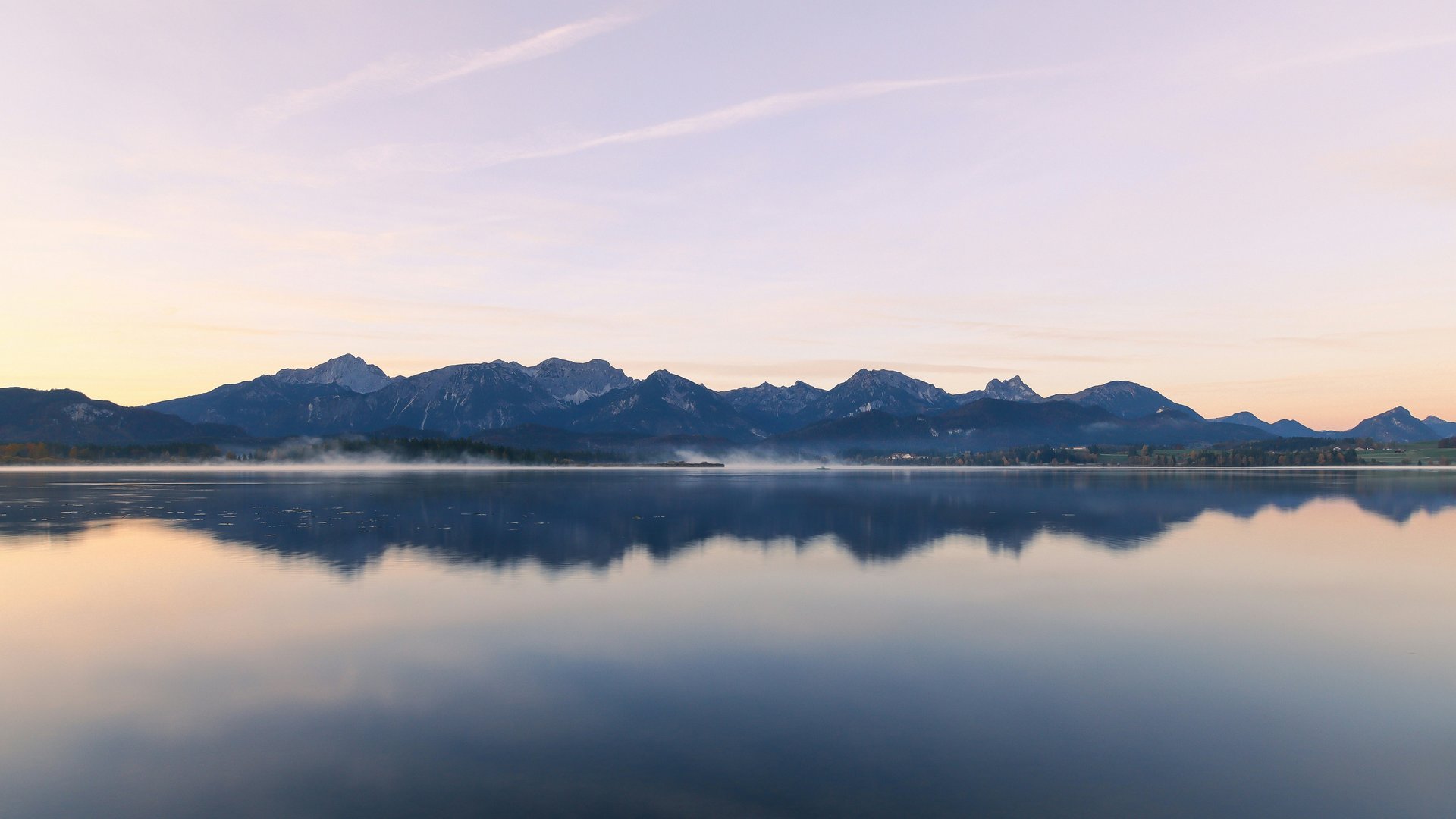 Attractions around Oberstdorf Lake with mountain reflection at sunrise
